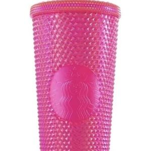 Pink studded Starbucks Cup.
